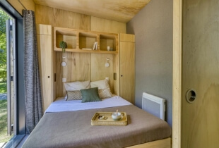 Chambre de la tiny house l'indépendante