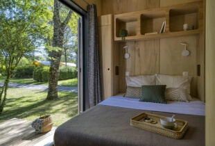 Chambre de la tiny house l'indépendante